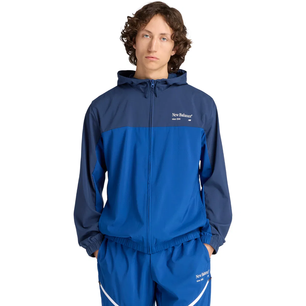 New Balance Reimagined Woven Graphic Track Top Herre Blue