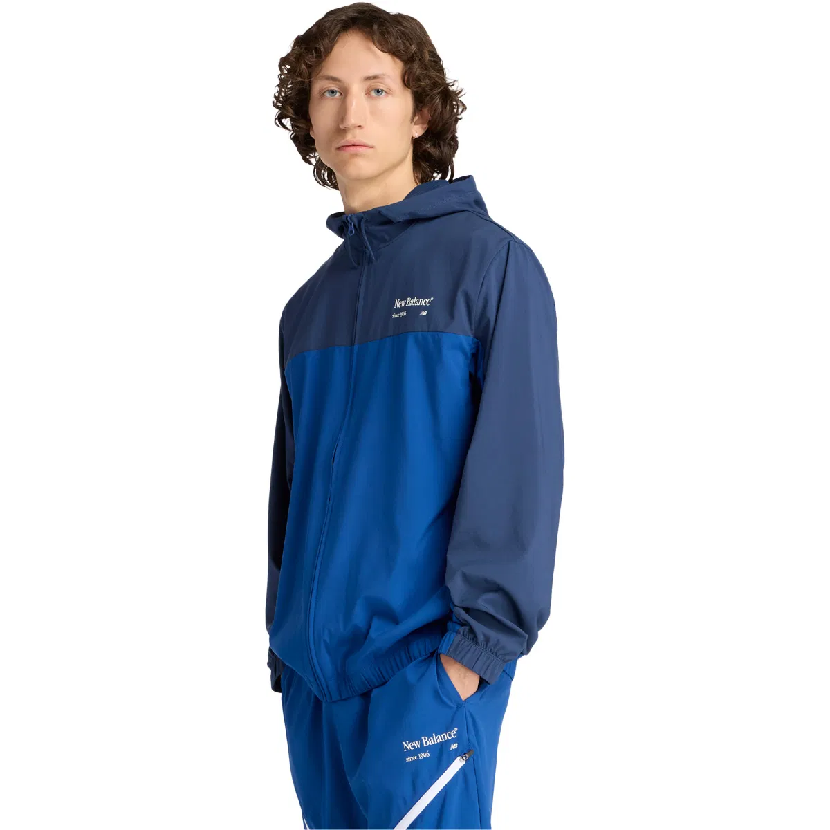 New Balance Reimagined Woven Graphic Track Top Herre Blue