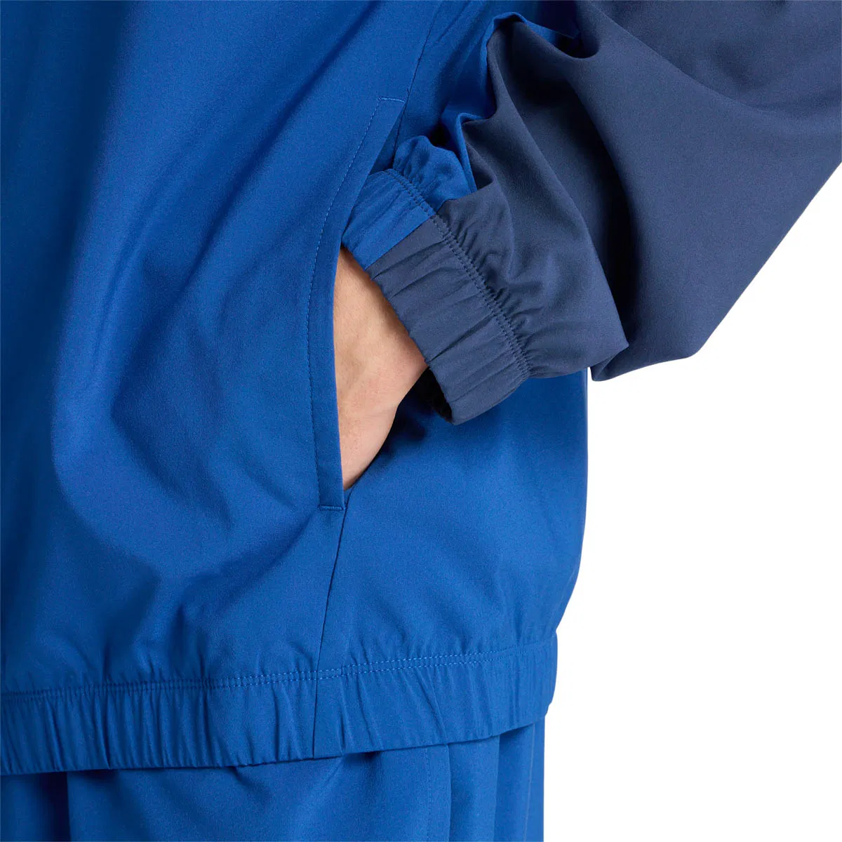 New Balance Reimagined Woven Graphic Track Top Herre Blue
